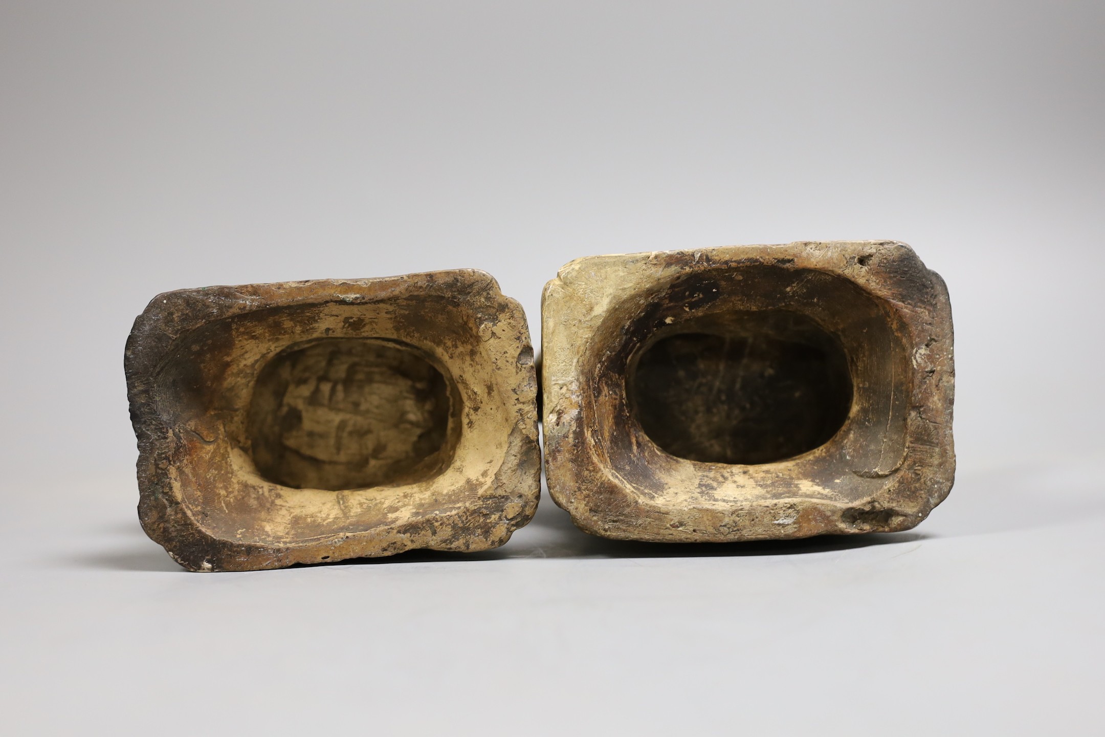 A pair of Chinese sancai lion dog joss-stick holders, late Ming dynasty, 20cm high